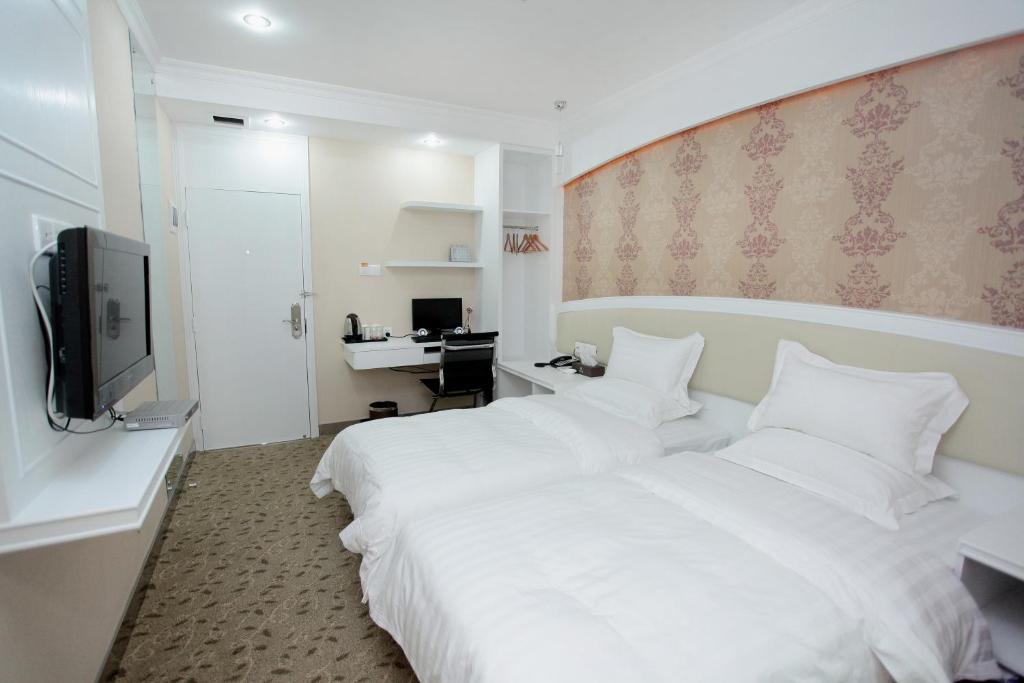 Xinghe Xinfeng Hotel Cantón Habitación foto